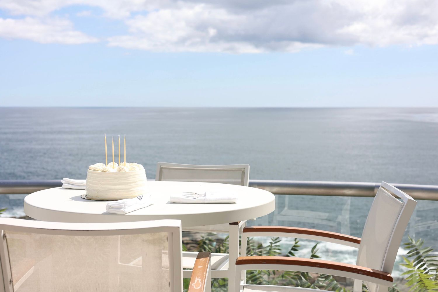 cake, ocean, tableside, vast horizon, monochrome cake, coastal maine
