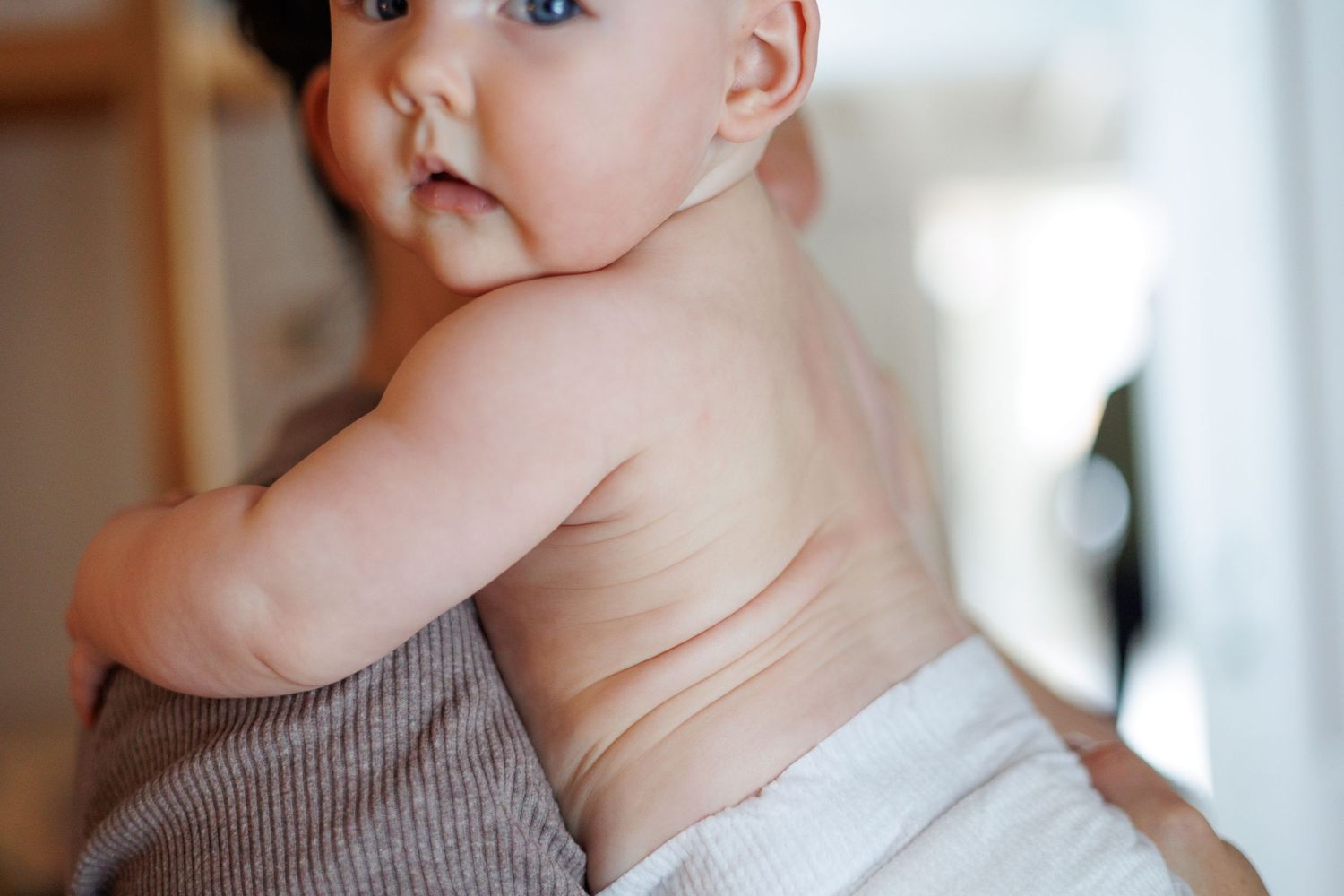baby looking back, diaper, newborn, north shore massachusetts