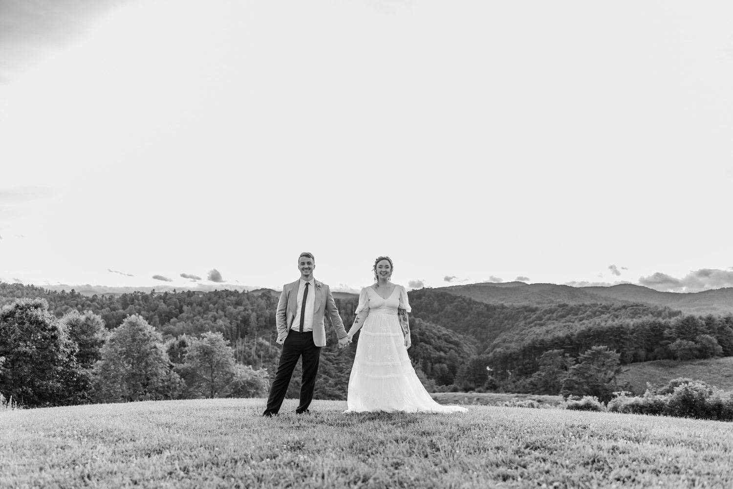 A series of romantic wedding photos showing a couple in a scenic outdoor setting with mountains and fields at the Barn at New River  NC