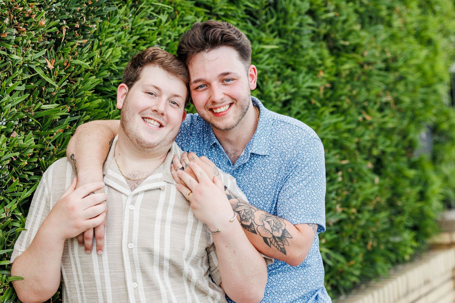 Romantic photoshoot in a lush garden setting with natural lighting with Charleston Engagement Photographer at Rainbow Row