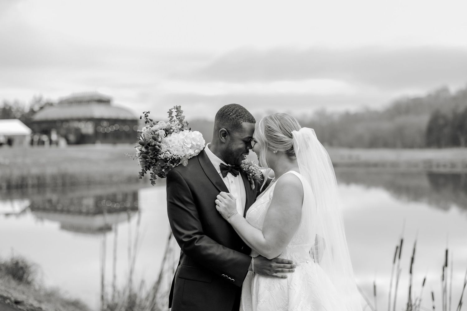 Intimate black and white wedding portrait with mountain lake backdrop at the Little Chapel with Winston Salem Wedding Photographer