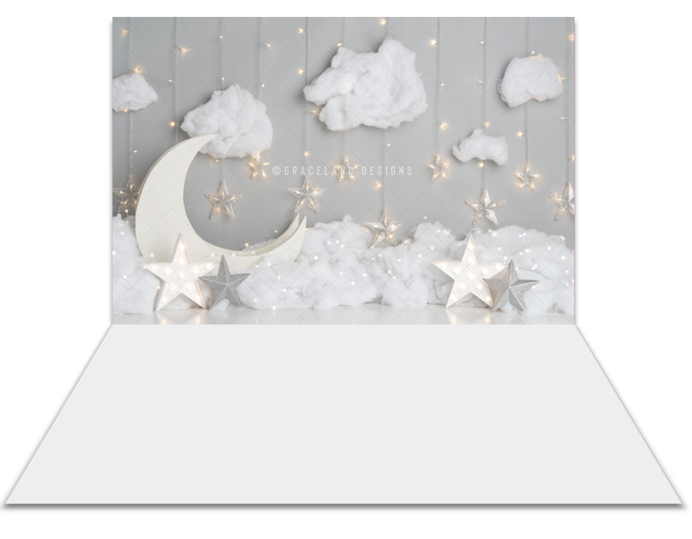 A dreamy baby shower backdrop featuring white clouds, a crescent moon, and gold stars on a soft gray background.