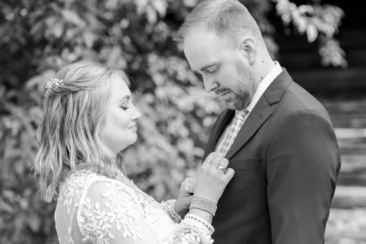 Series of romantic black and white portraits showing tender moments between couple.