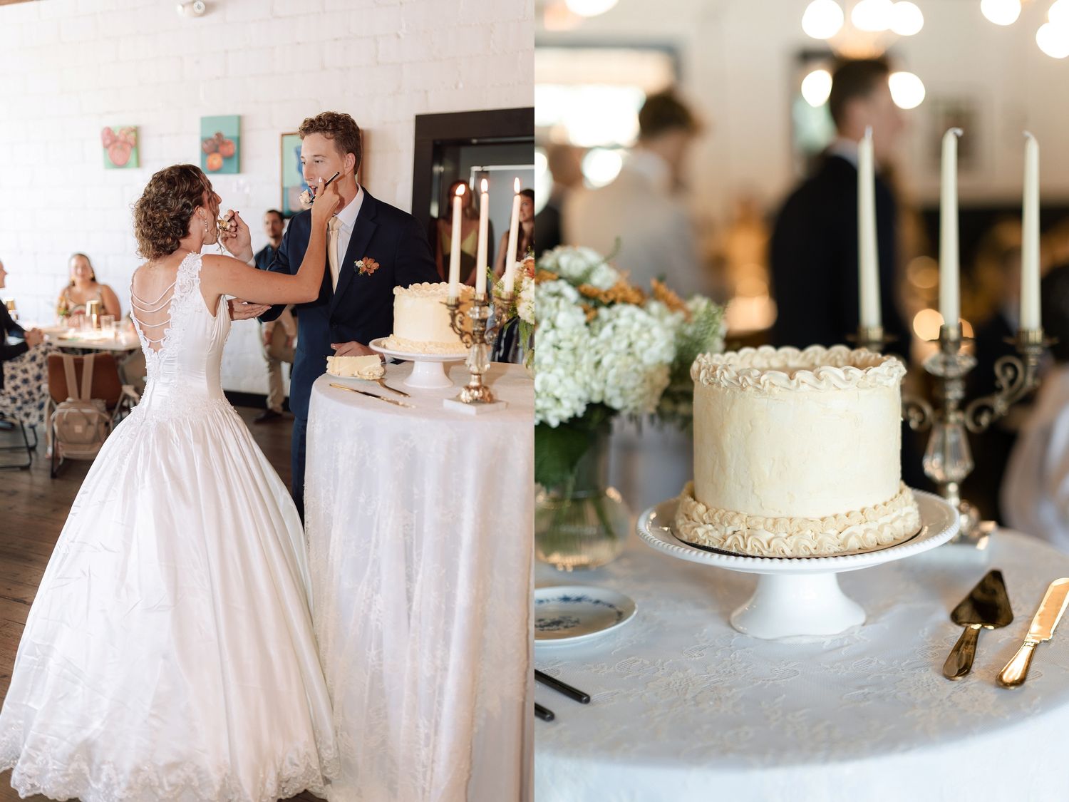Bride feeds groom wedding cake at reception beside an elegant single-tier white frosted cake.