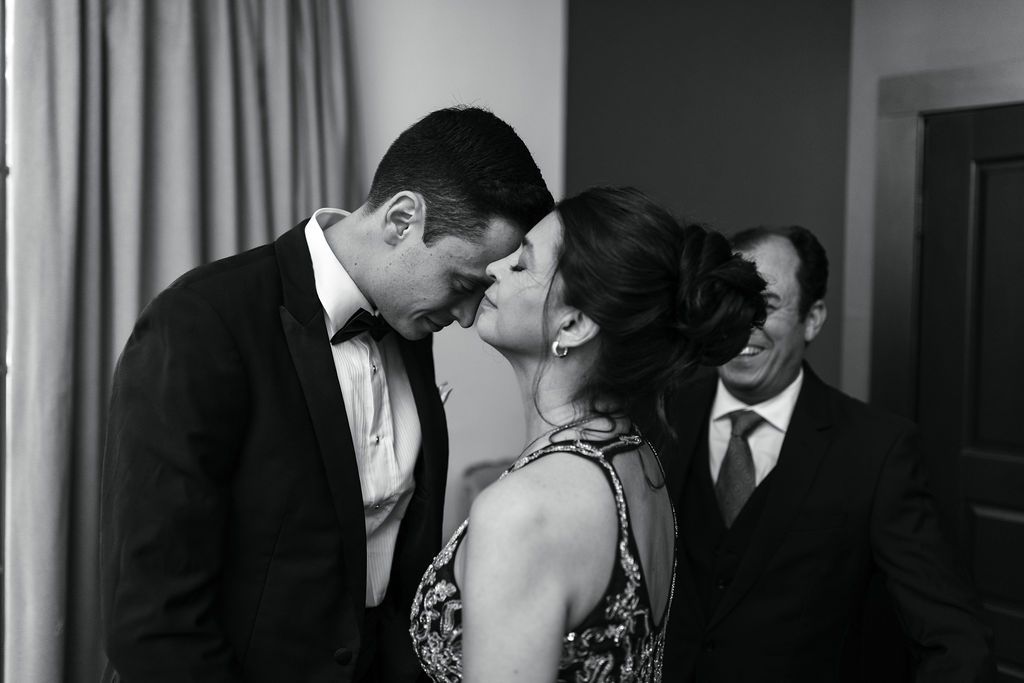 Groom and his mom share an emotional moment