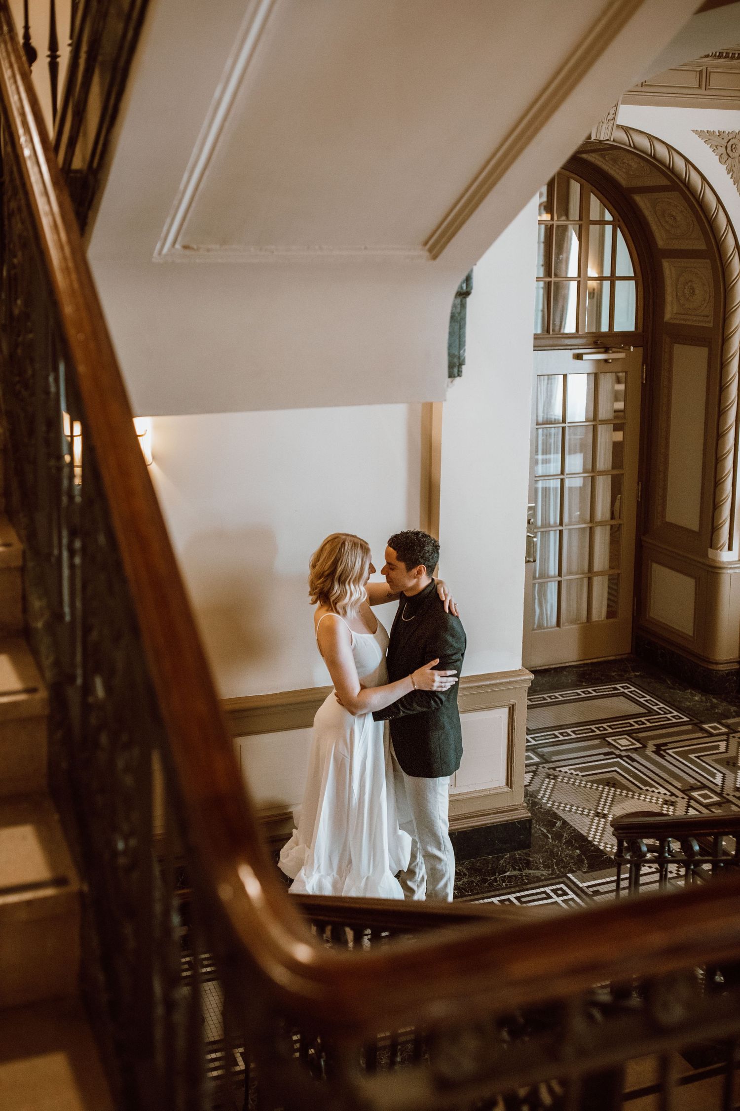 A couple on the Westin Poinsett Hotel Mezzanine