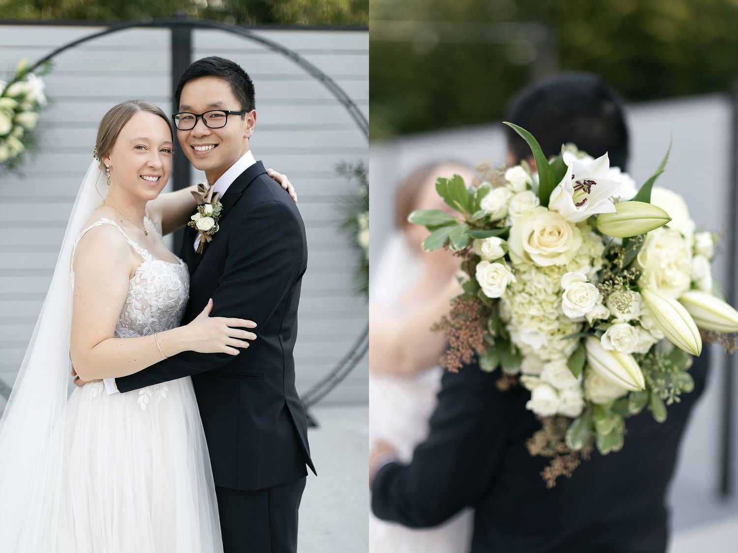 Wedding couple posing against gray circular backdrop with elegant white and green floral bouquet detail.