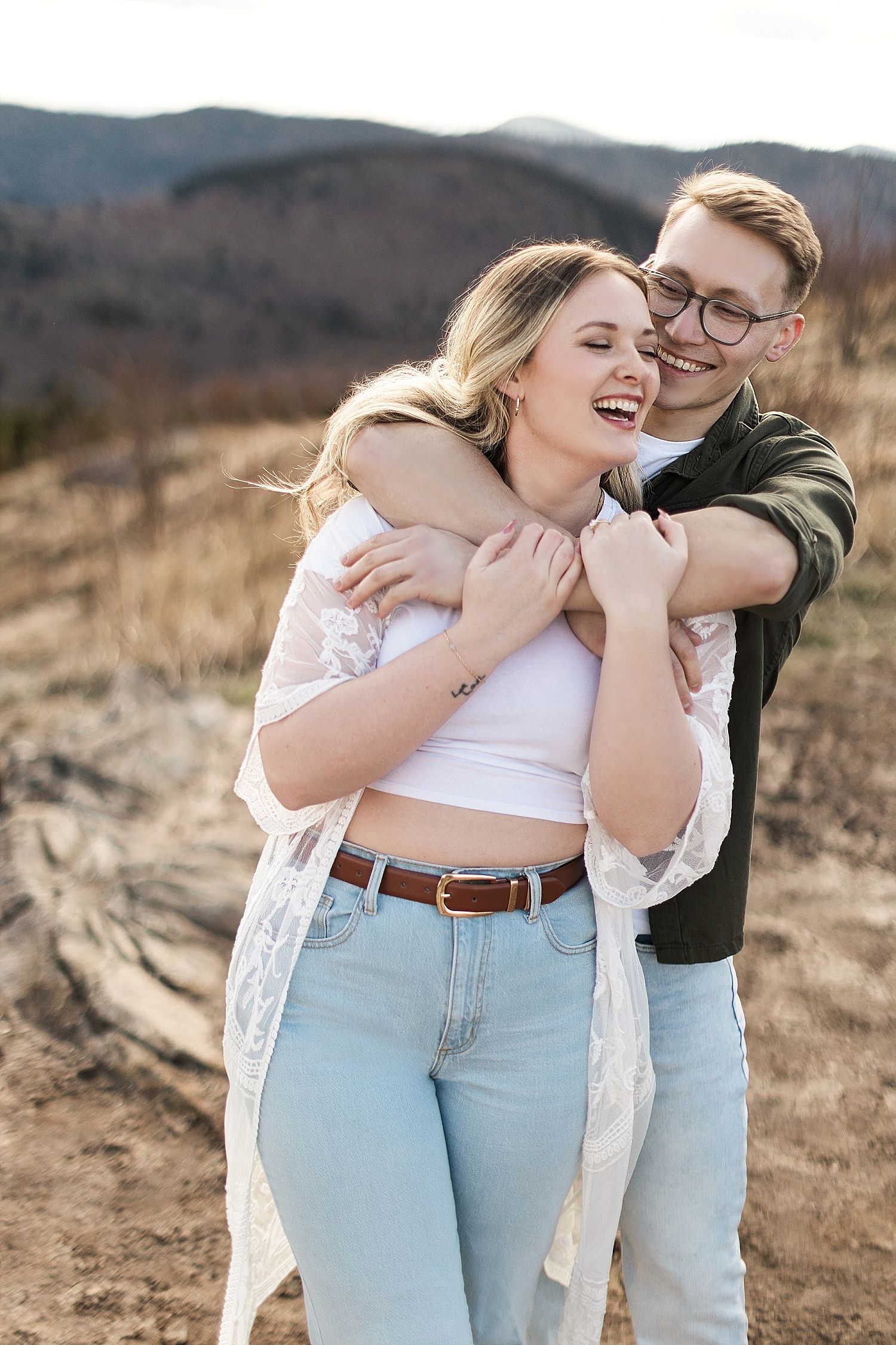 Couple laughing during engagement photos