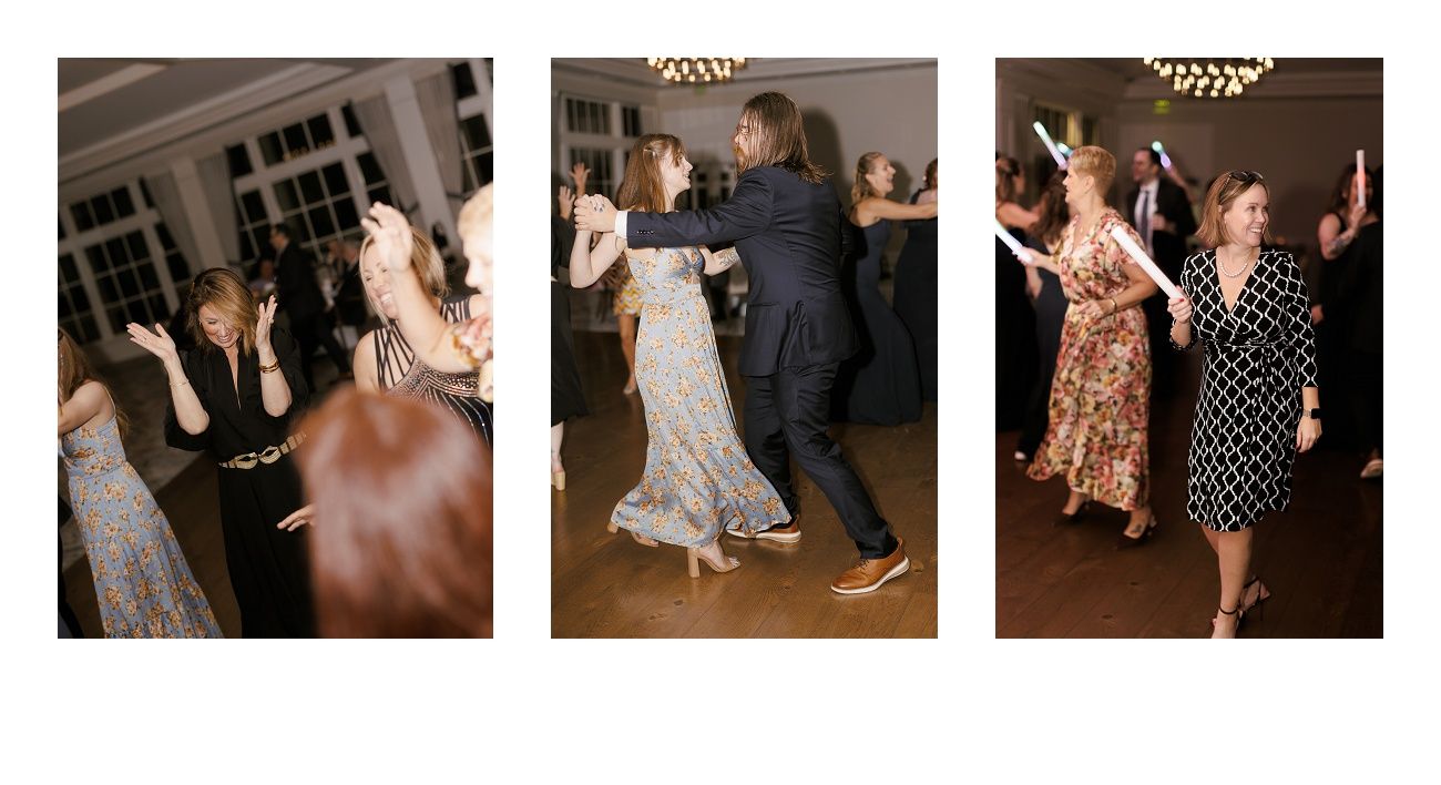 Wedding guests dancing and celebrating on a lively dance floor at a reception.