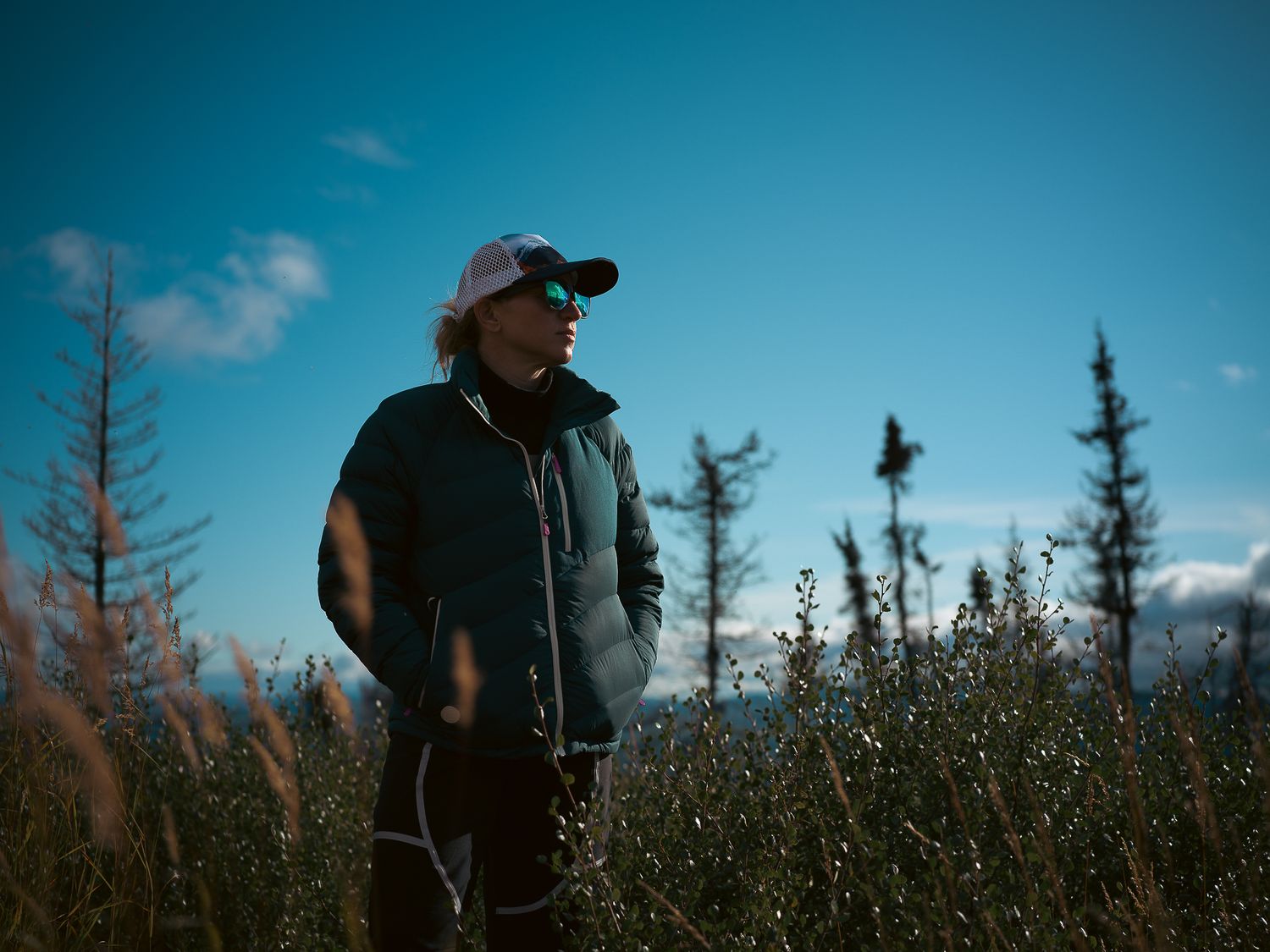Rachel overlooking the mountains of Charlie Dome