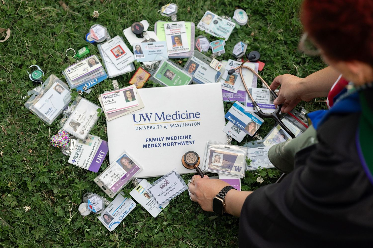 Graduation keepsakes and cards spread out on the grass