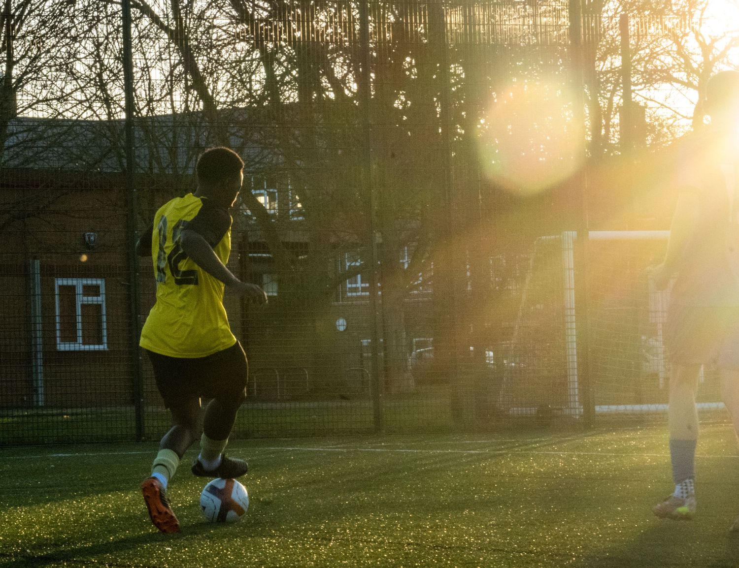 Sun glare football match.