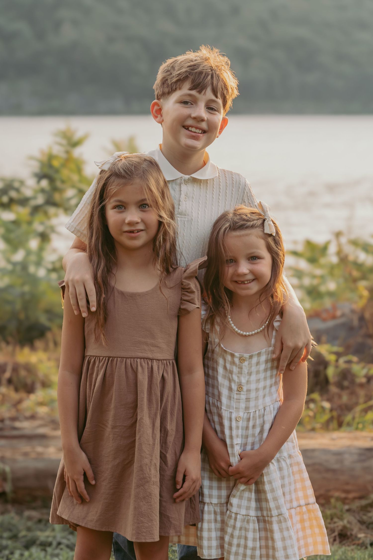 Sunset family portrait at Hudson Valley park, featuring warm, candid storytelling. Captured by Nichole JG Photography in Hudson Valley