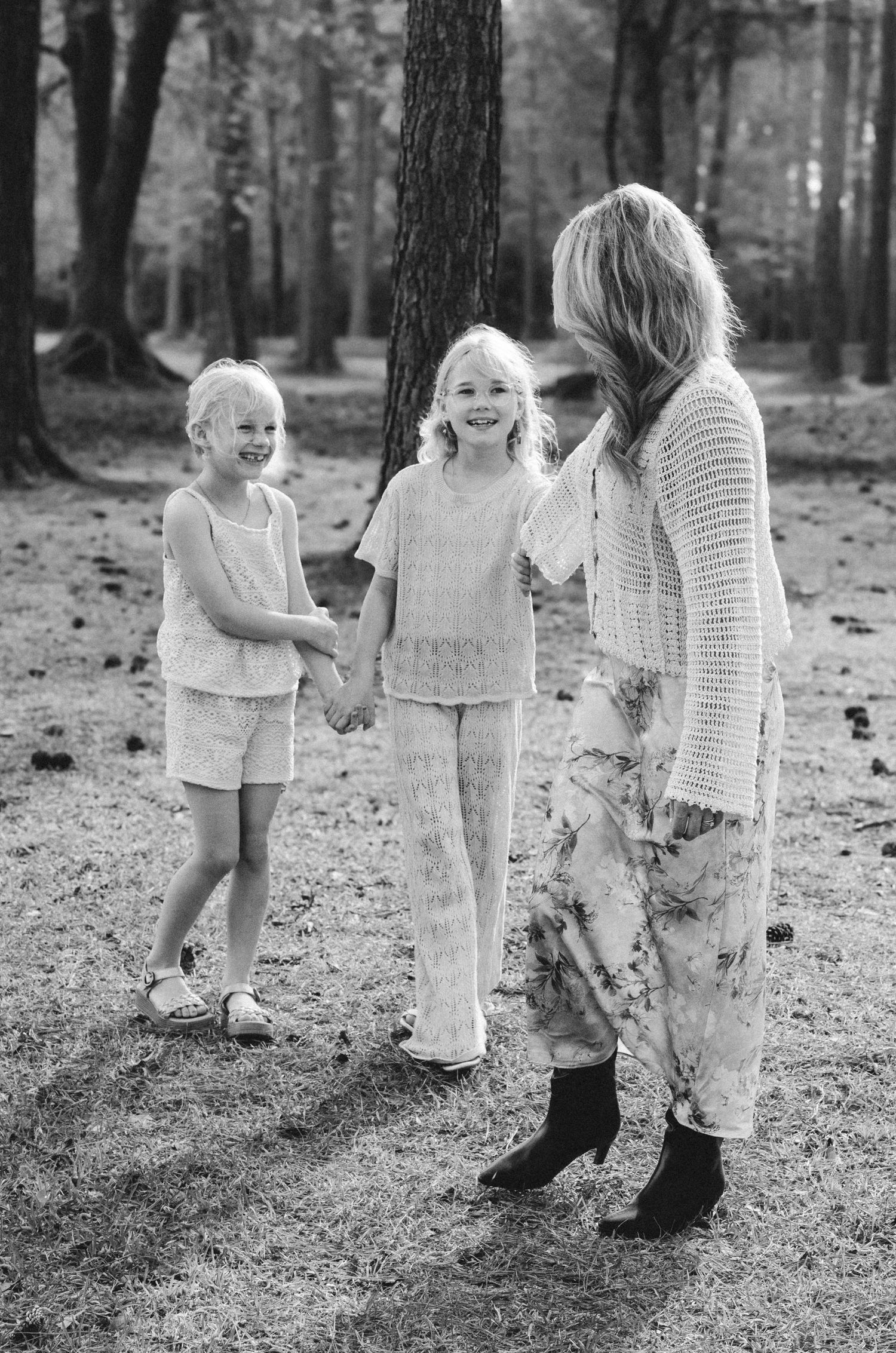 Family portrait in Coastal Carolina forest, warm & nature‑inspired storytelling. By Nichole JG Photography.