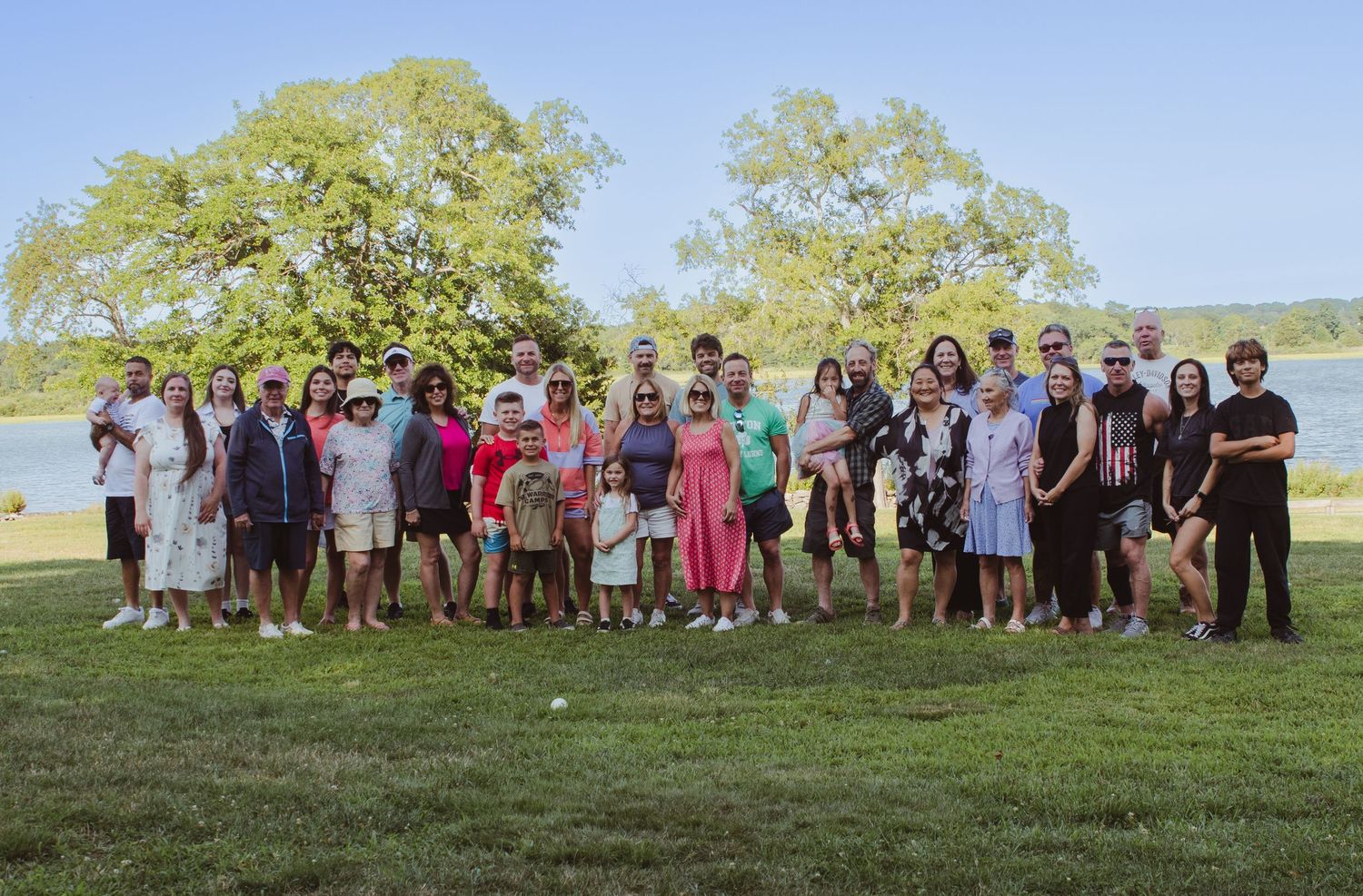 Hudson Valley family reunion filled with laughter, hugs, shared stories, and generations gathered in love.