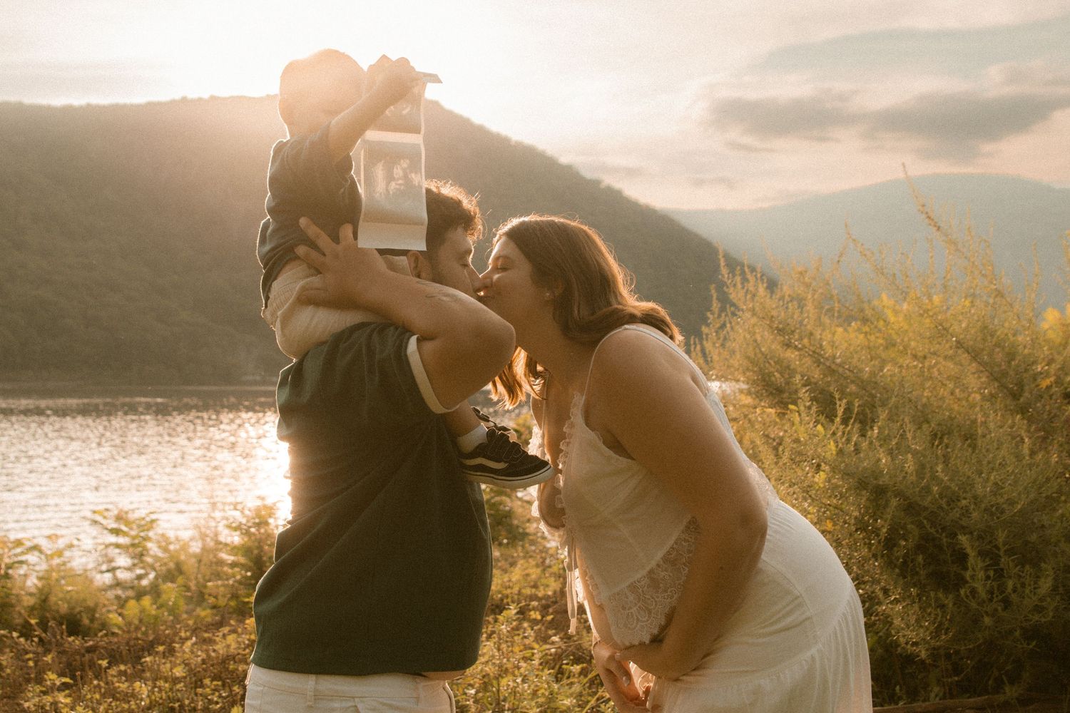 Family portrait of couple at Hudson Valley park, featuring warm, candid storytelling. Captured by Nichole JG Photography in Hudson Valley