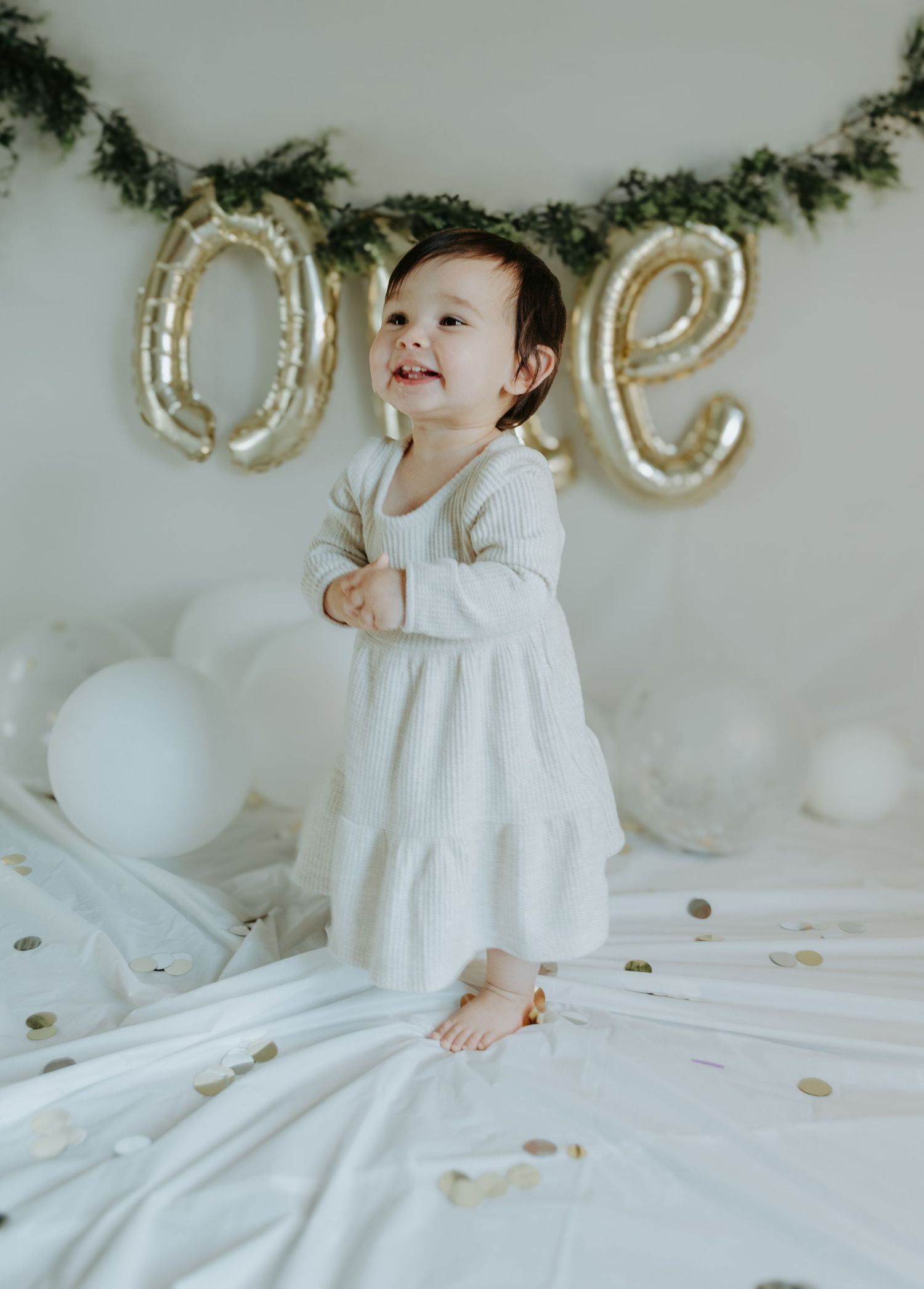 One‑year‑old milestone portrait in Coastal Carolinas, joyful & candid storytelling. Captured by Nichole JG Photography.
