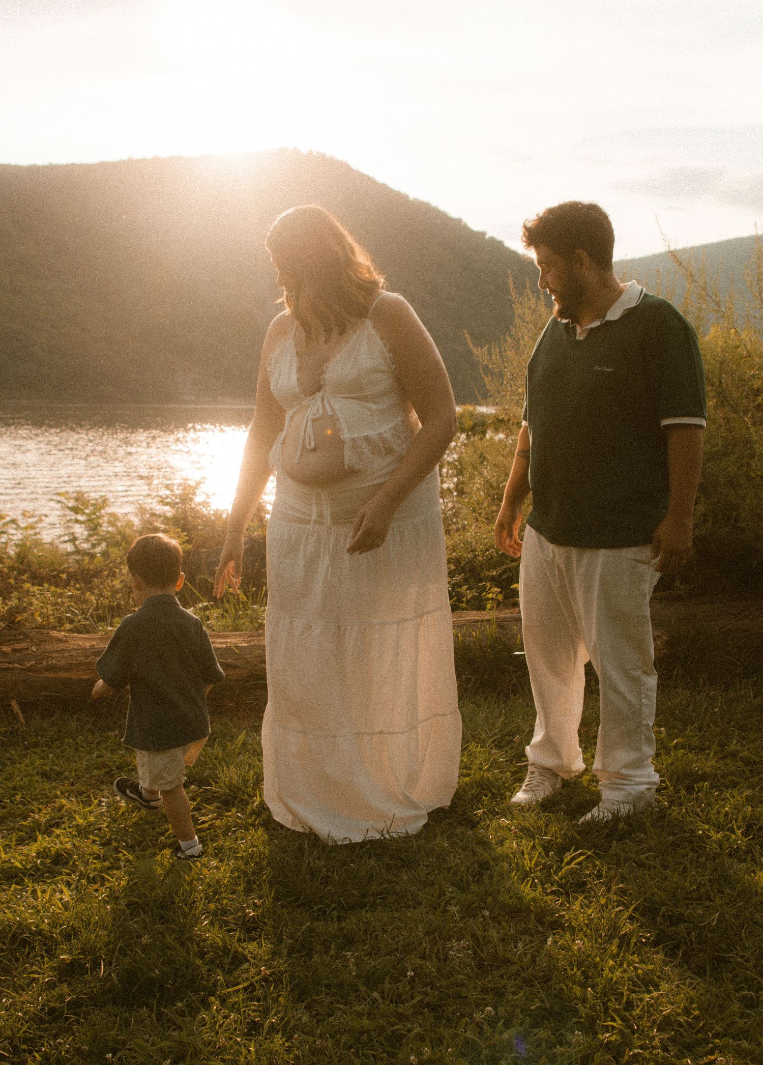 Family portrait of couple at Hudson Valley park, featuring warm, candid storytelling. Captured by Nichole JG Photography in Hudson Valley