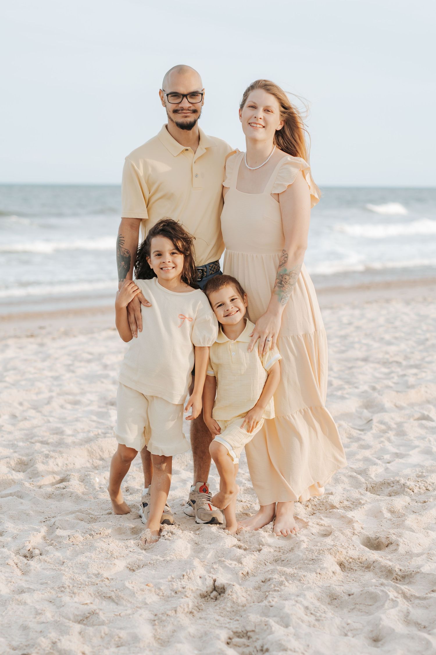Family portrait in Coastal Carolina beach, warm & nature‑inspired storytelling. By Nichole JG Photography.