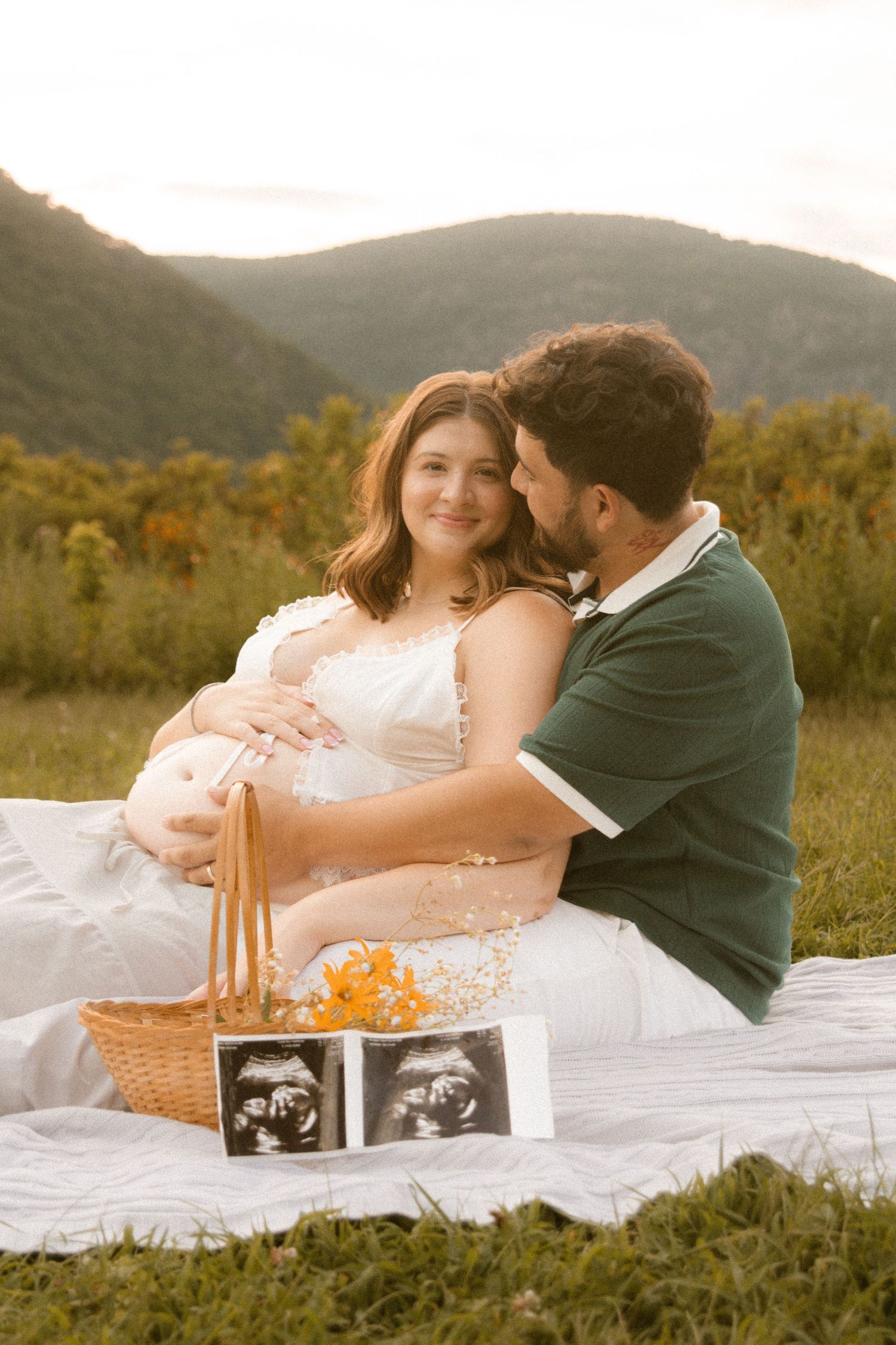 Maternity portrait of couple at Hudson Valley park, featuring warm, candid storytelling. Captured by Nichole JG Photography in Hudson Valley