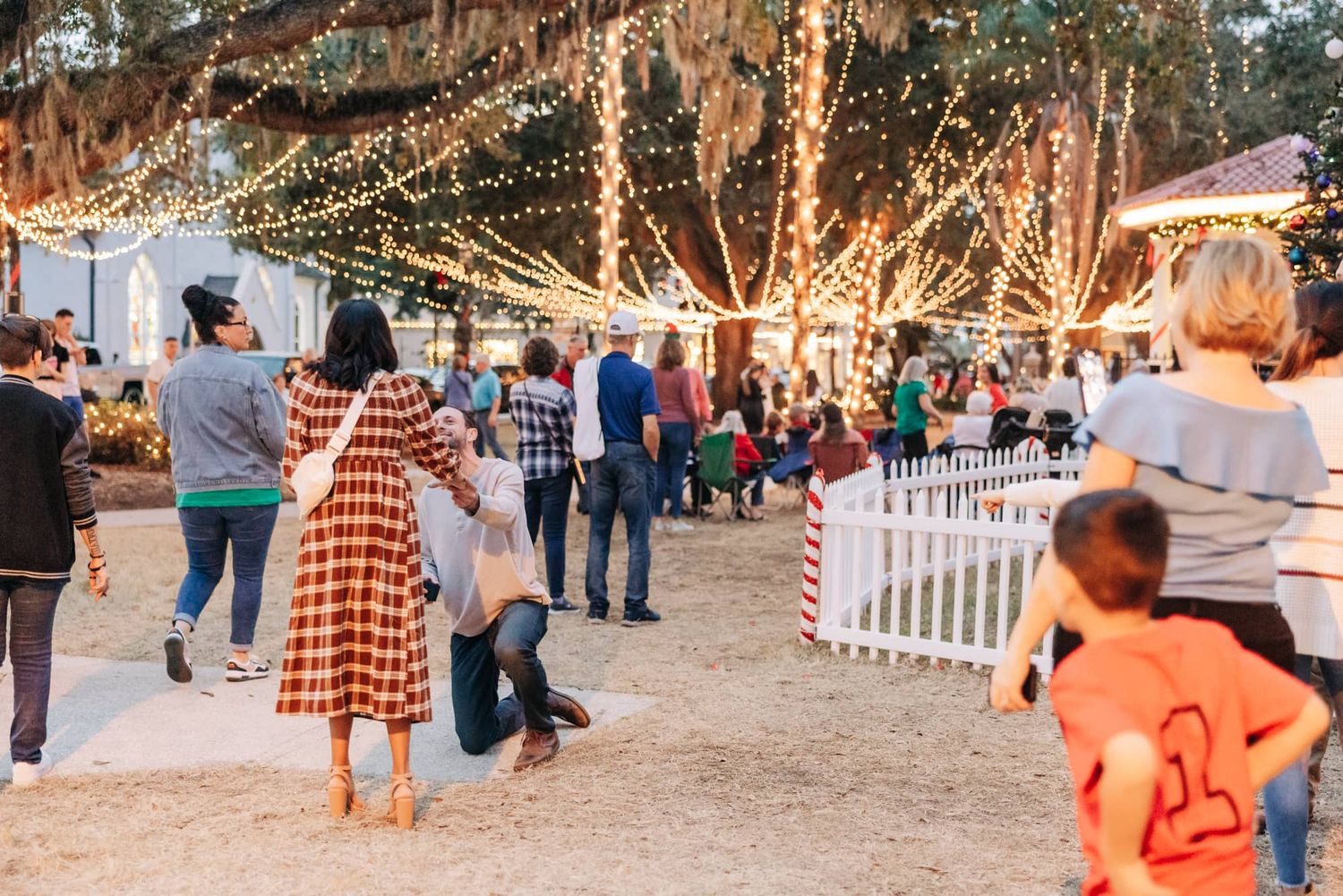 man proposing to woman during night of lights in st Augustine fl