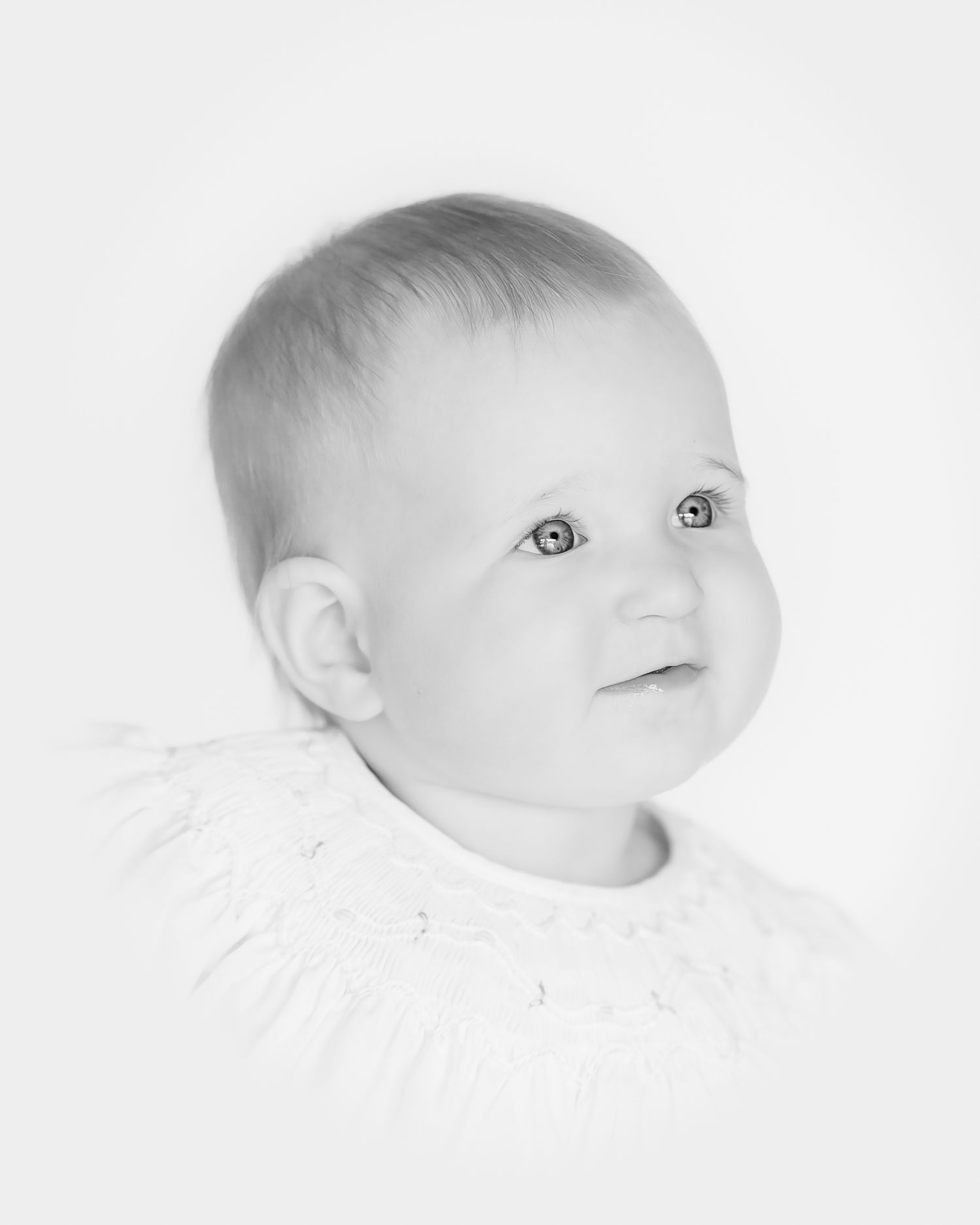 heirloom portrait jacksonville fl of baby girl in black and white looking off