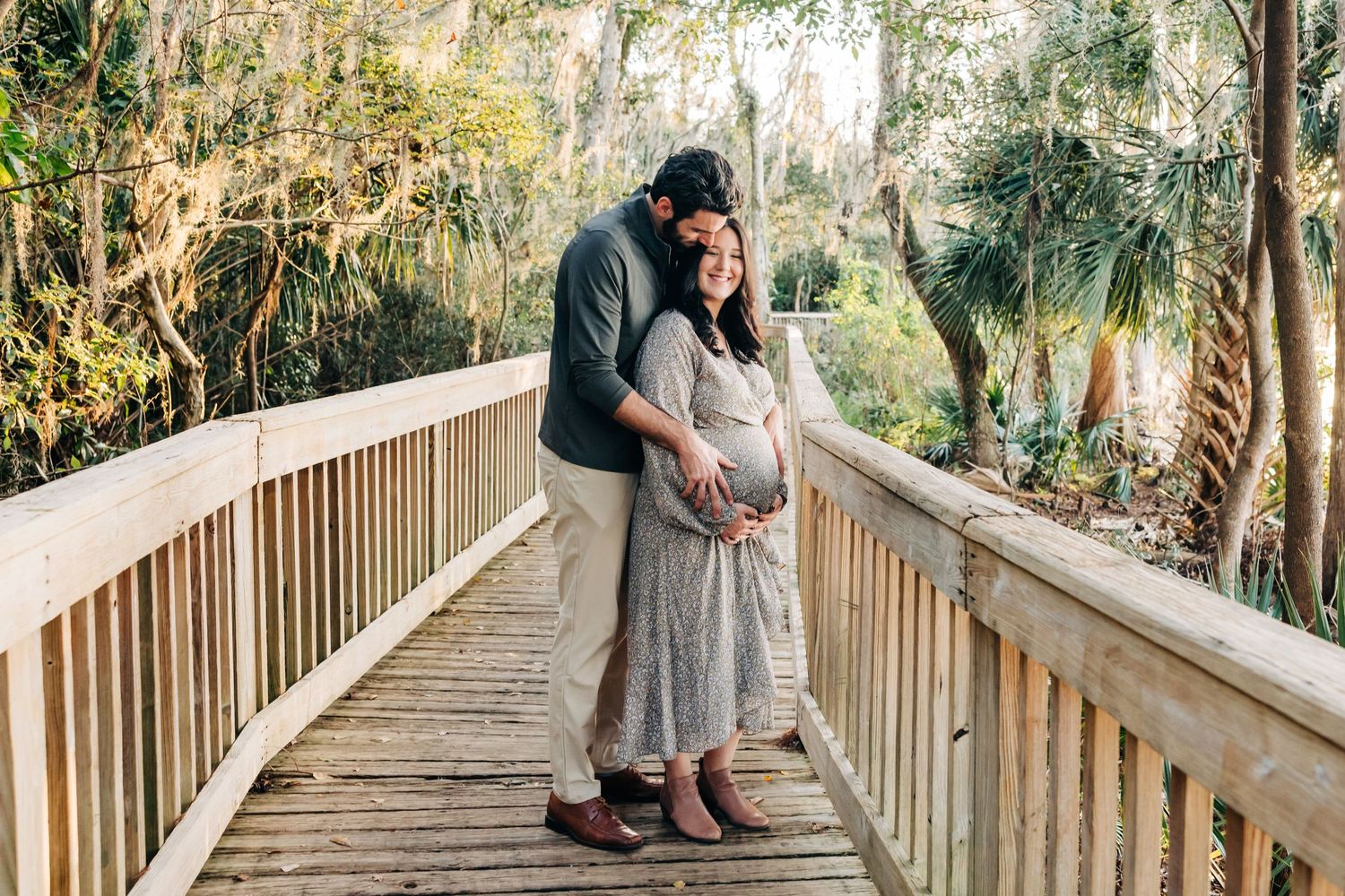 pregnant couple on the dock