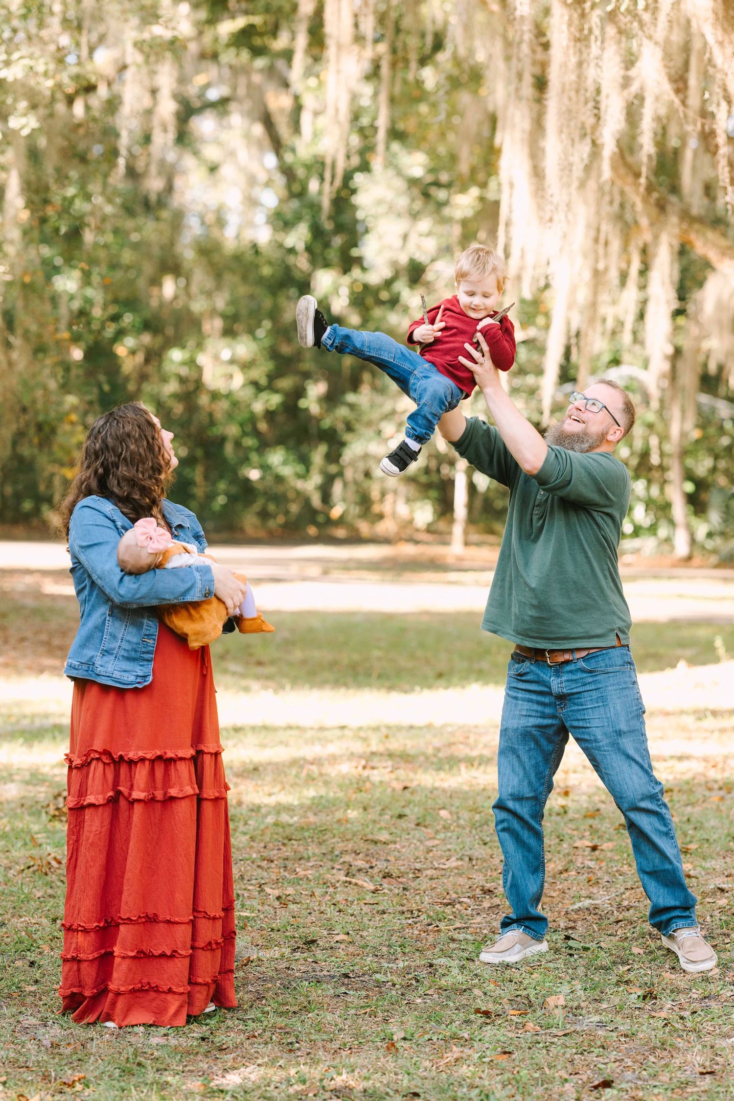 family playing in the park