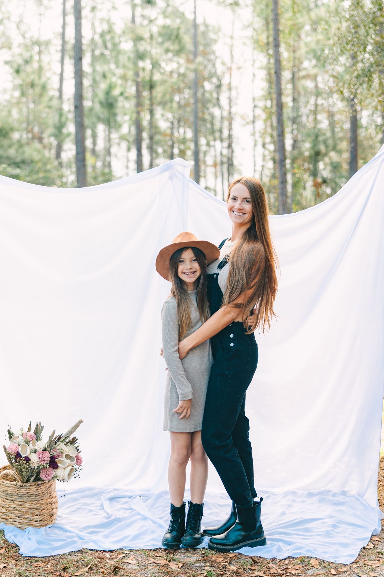 mom and daughter smiling