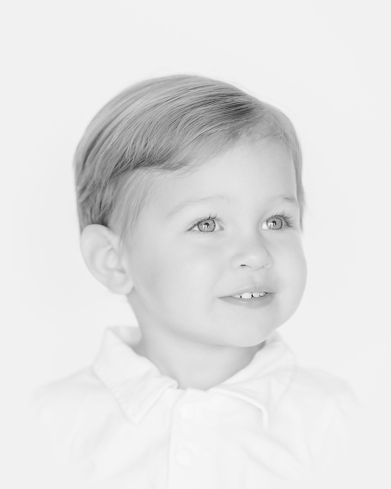 heirloom portrait of little boy looking off to the right