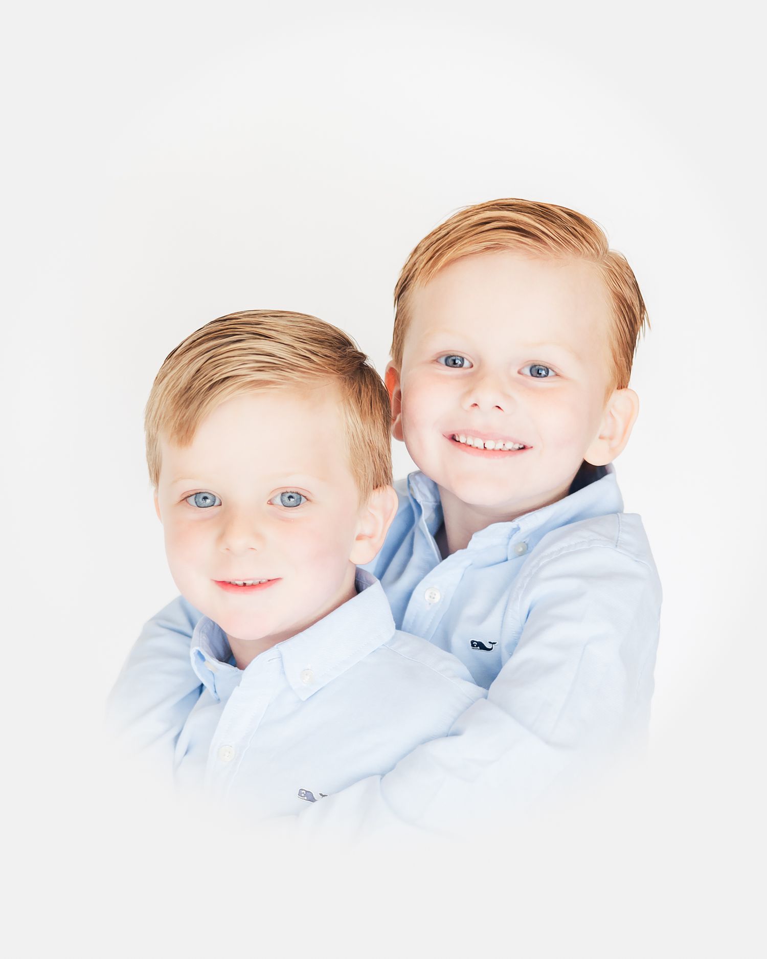 color heirloom portrait of two brothers in blue button downs