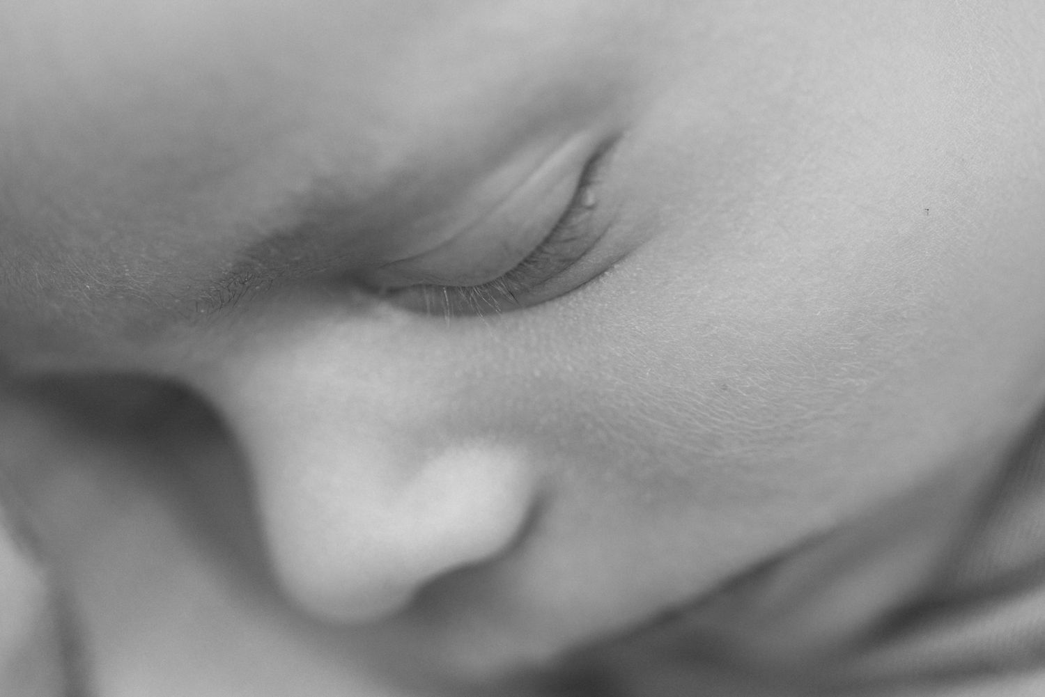 black and white close up of newborn baby face in Jacksonville, fl