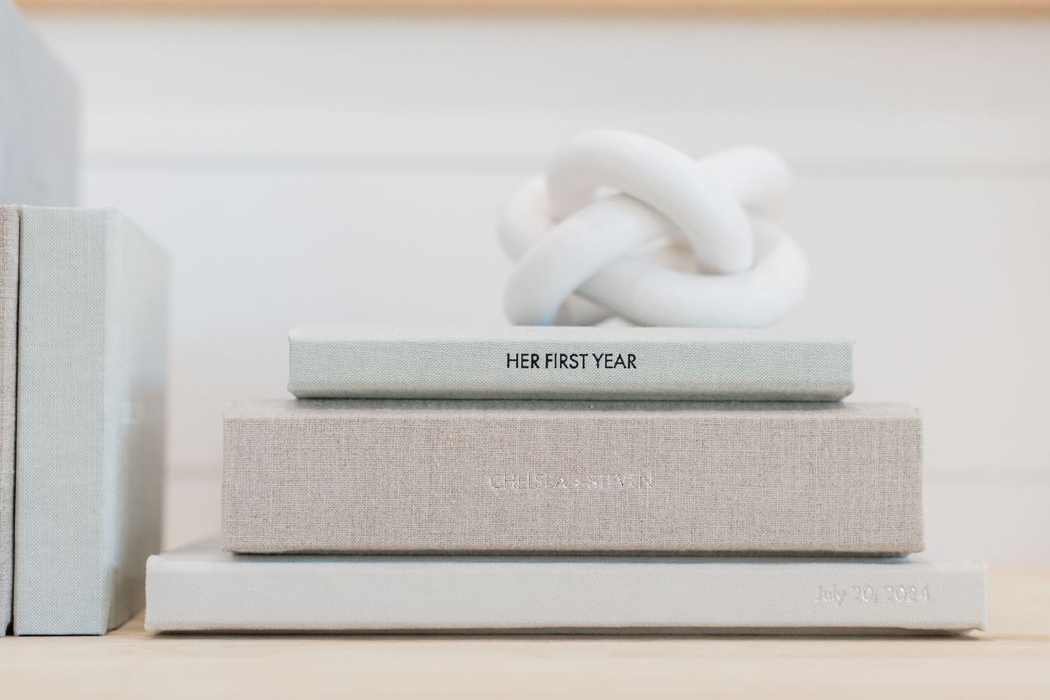 albums stacked decoratively on a bookshelf