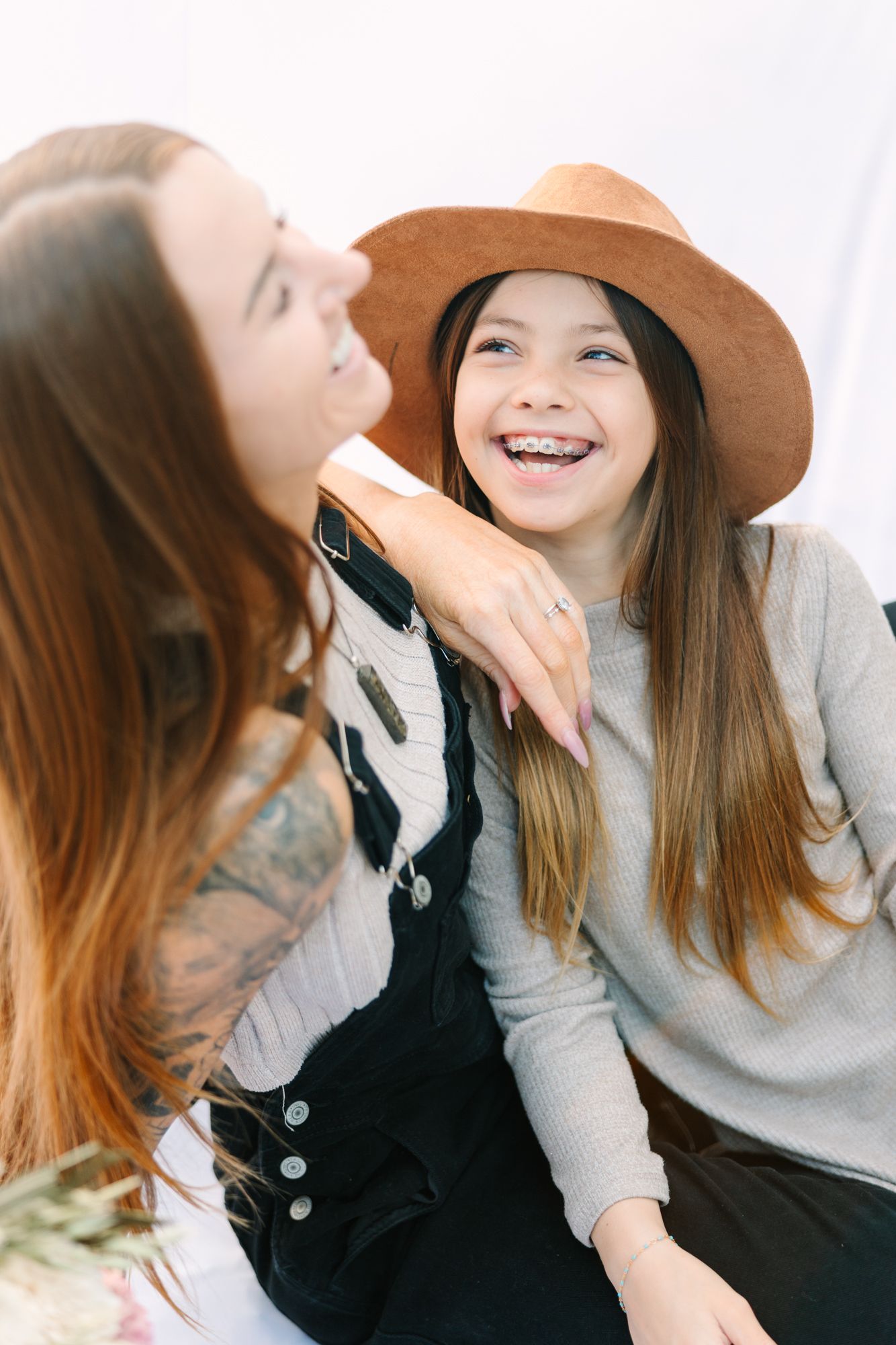 daughter laughing looking at mom