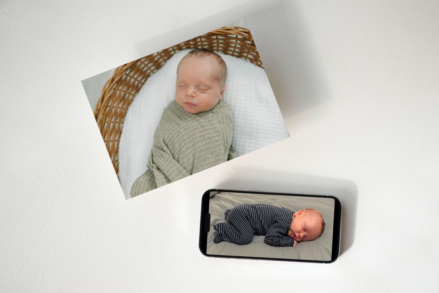 difference between iPhone image and printed artwork of baby in by a Jacksonville fl photographer
