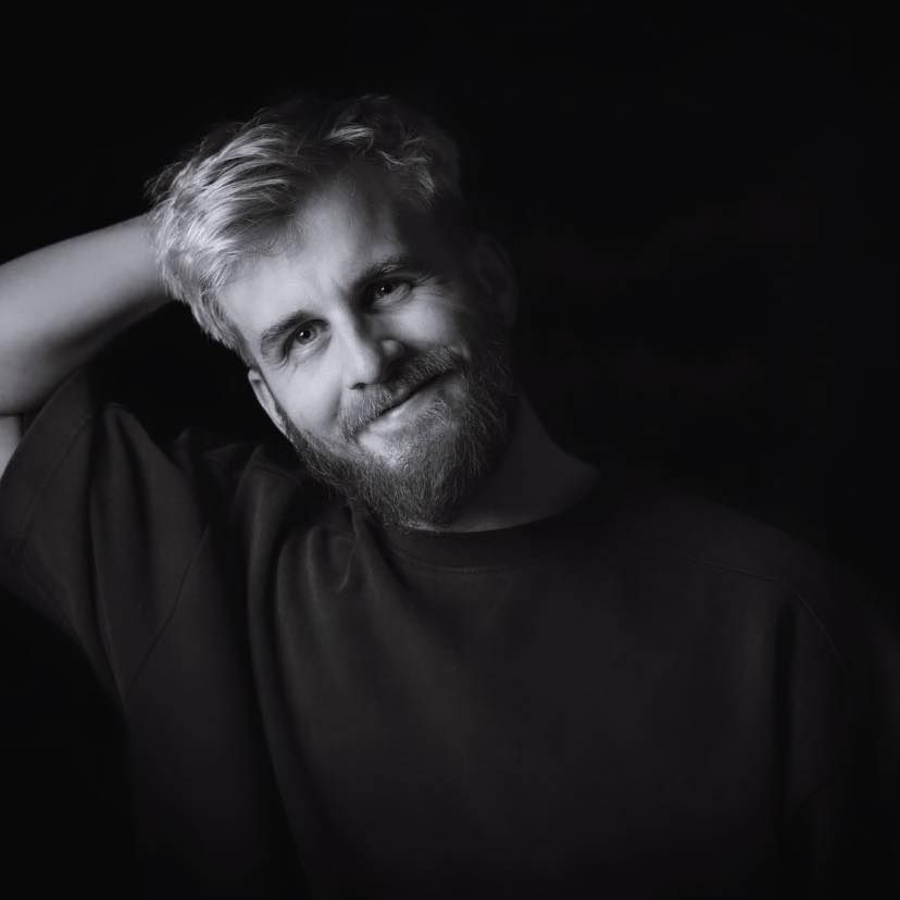 Artistic black and white portrait sequence with dramatic shadows and lighting effects.