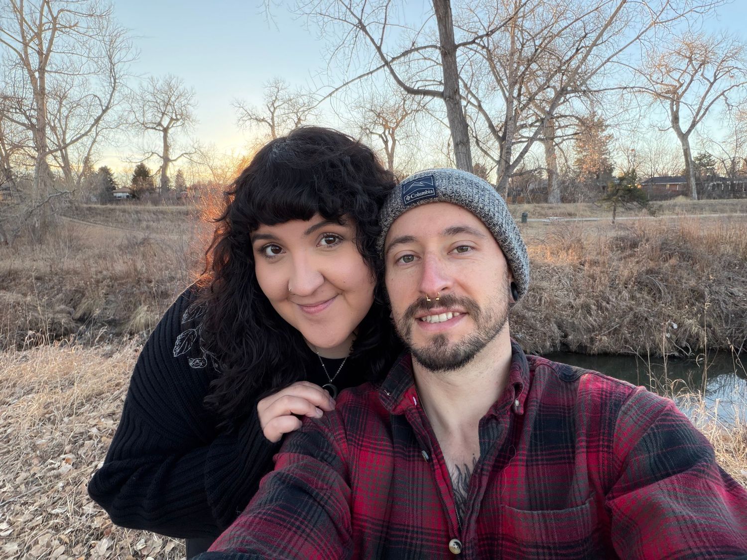 Casual outdoor selfie taken in a natural winter setting.