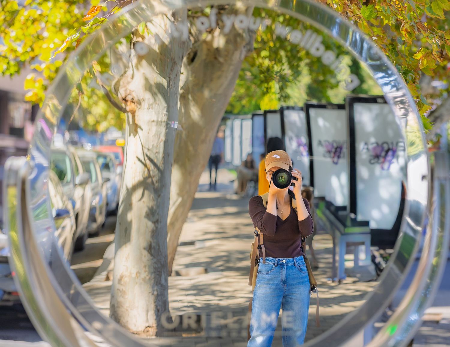 Phototgraph, woman, with camera