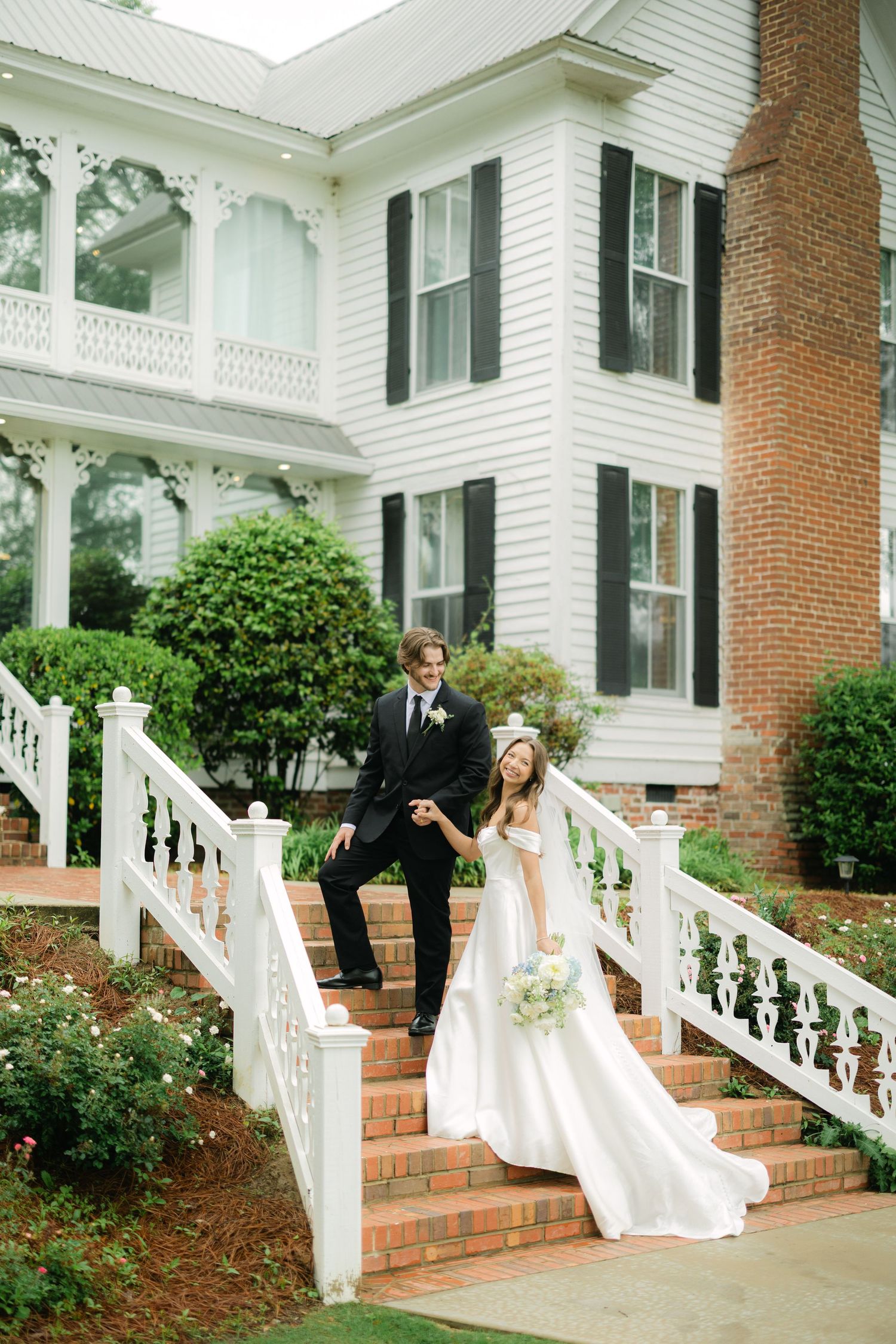 Bride and groom portrait on stairs
