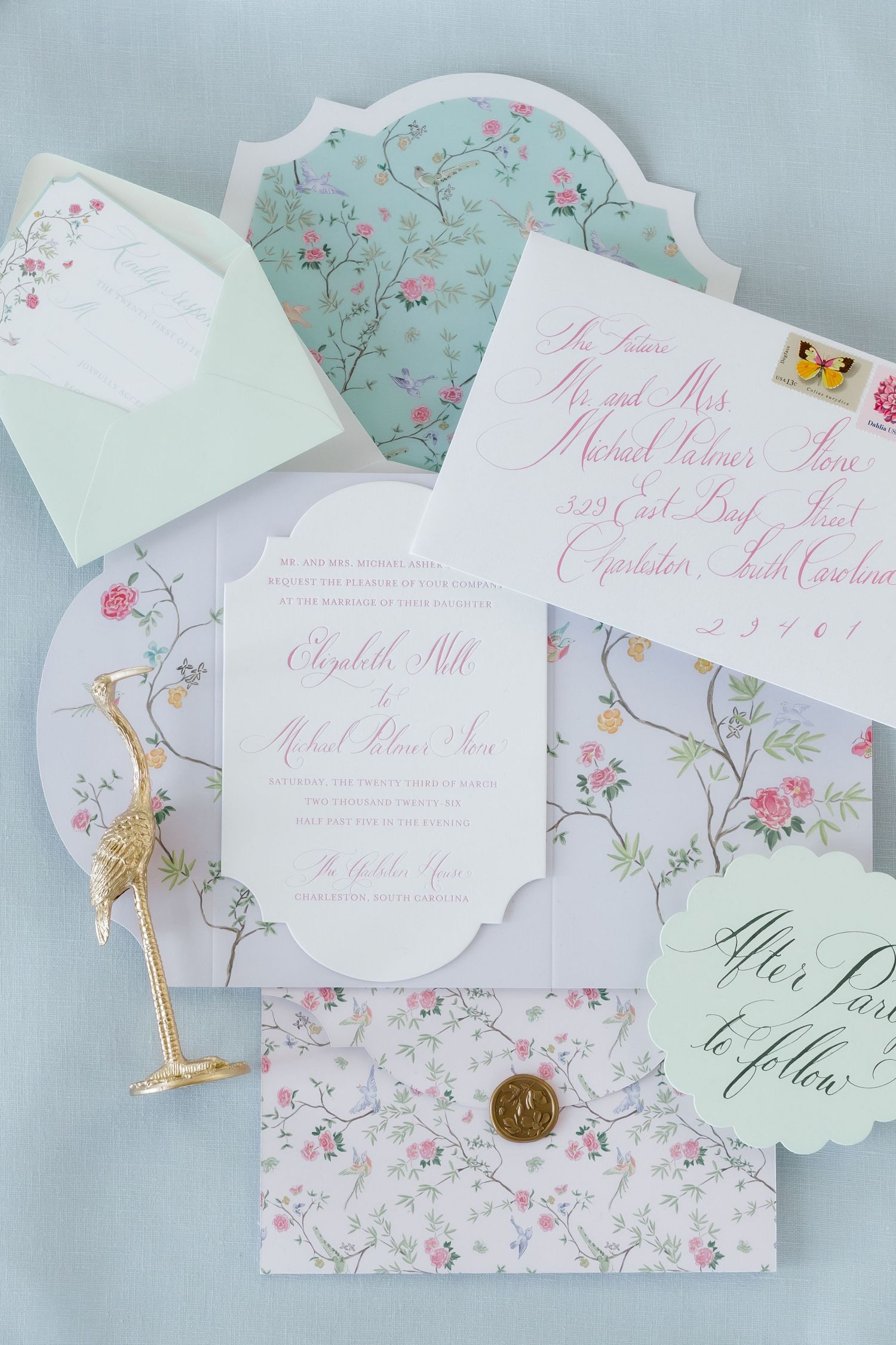 Elegant wedding invitation suite with floral patterns in mint green and pink calligraphy and decorative details.