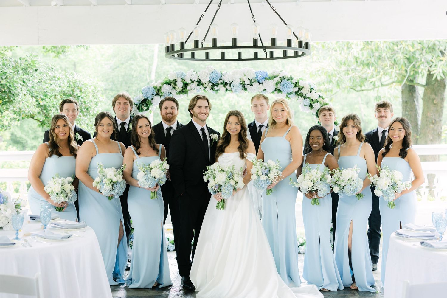 Bride and groom with wedding party portrait