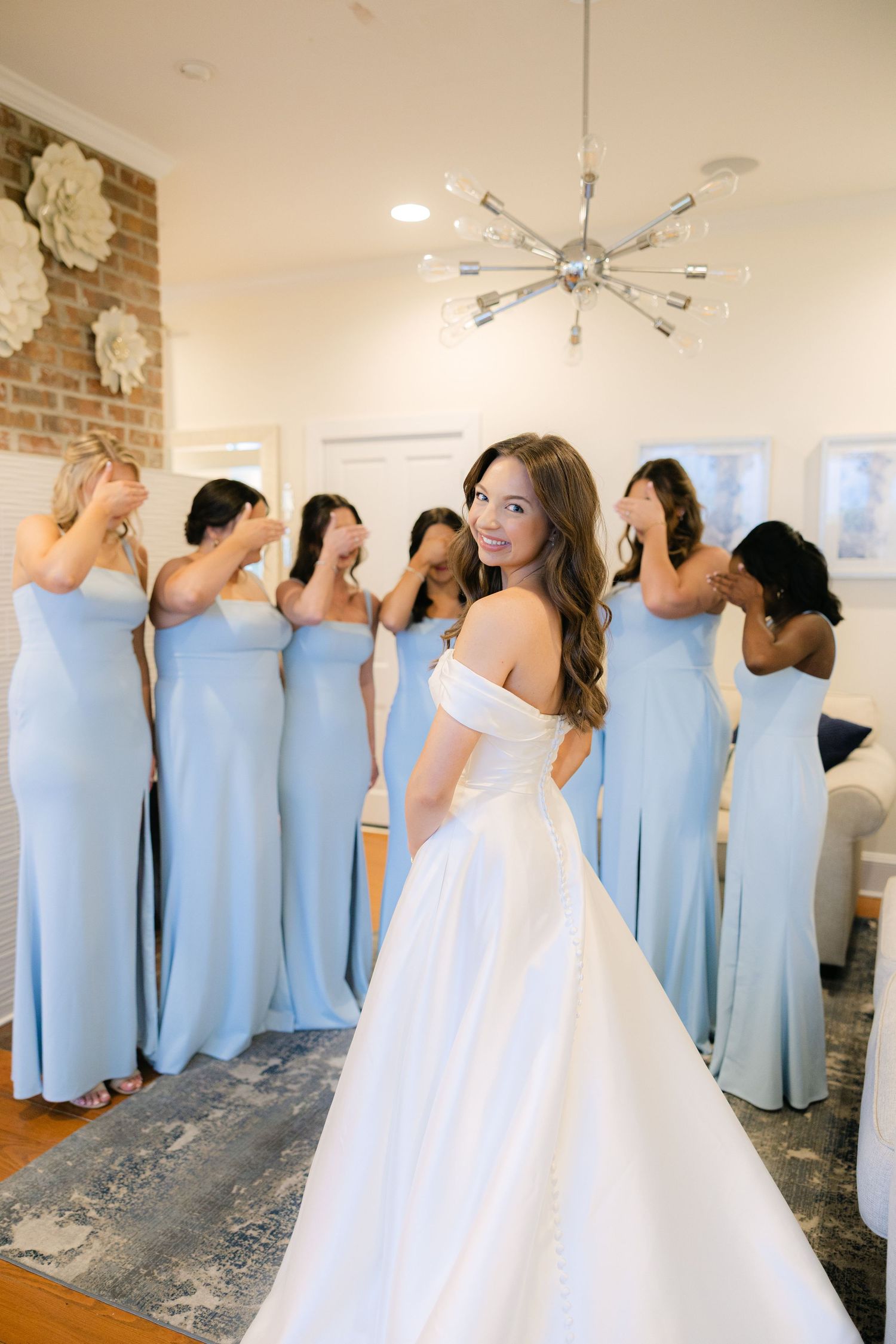 Bridal first look with bridesmaids