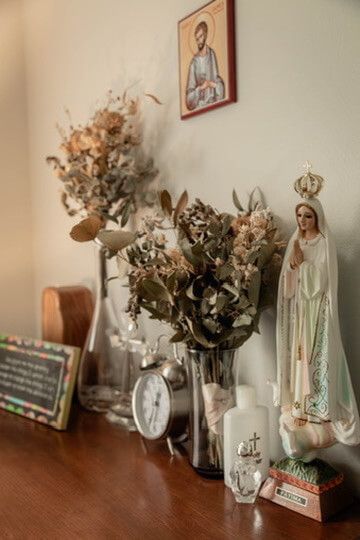 Nursery detail photo with Catholic imagery from indoor newborn photography session in Omaha, Nebraska