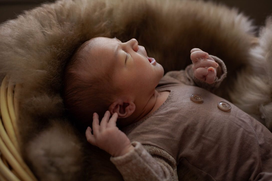 Baby boy profile picture from newborn lifestyle photography session in Omaha, Nebraska