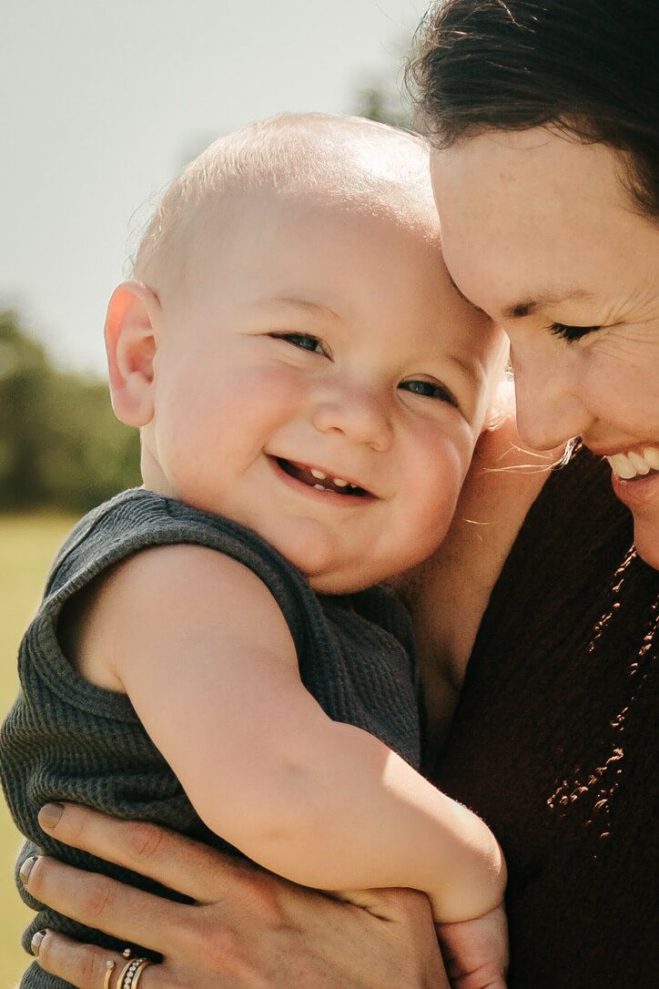 Outdoor family photography session with mother and baby in Omaha, Nebraska