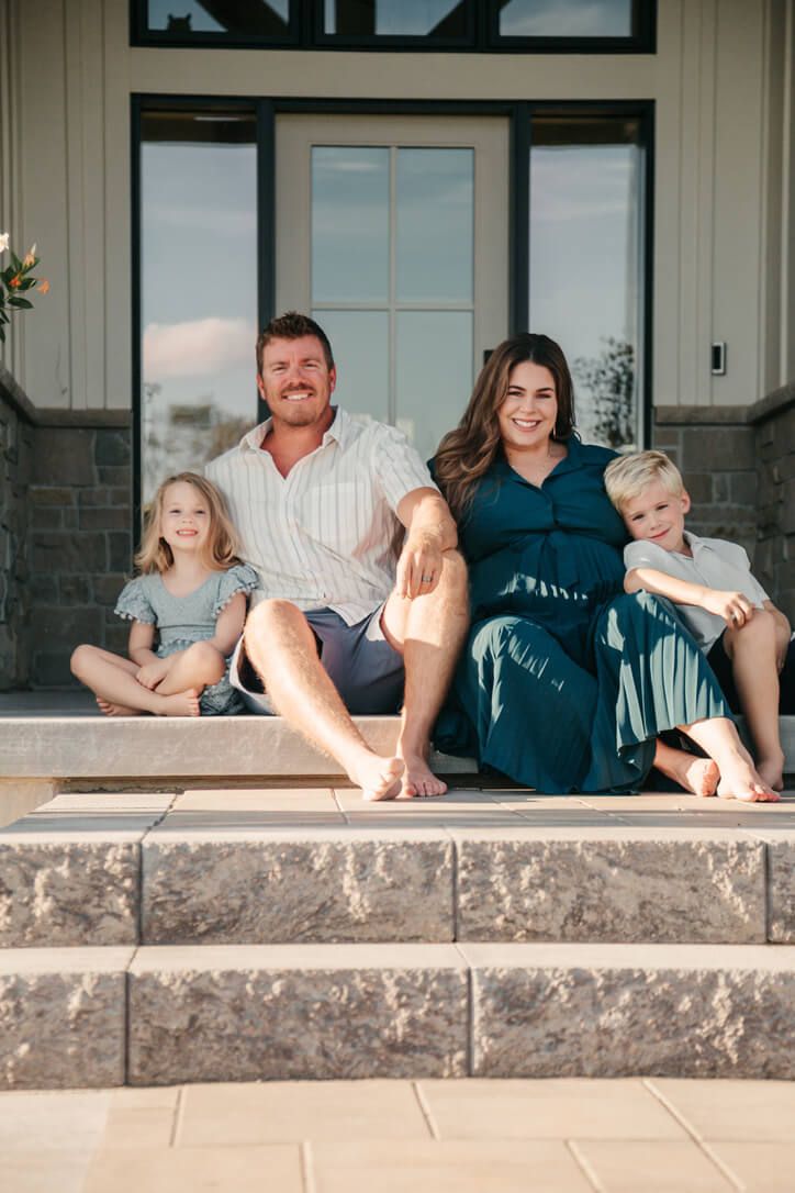 Outdoor lifestyle family photography session with parents and children in Omaha, Nebraska