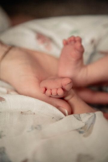 Baby boy toes from newborn lifestyle photography session in Omaha, Nebraska