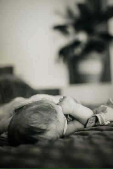 Baby boy black and white image from newborn lifestyle photography session in Omaha, Nebraska