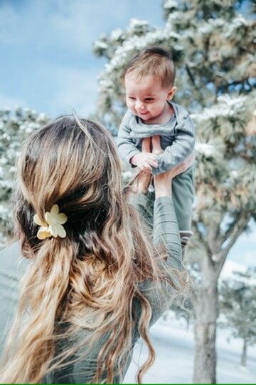 Indoor lifestyle family photography session with mother and baby in Omaha, Nebraska