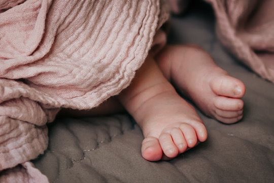 Baby girl toes from newborn lifestyle photography session in Omaha, Nebraska